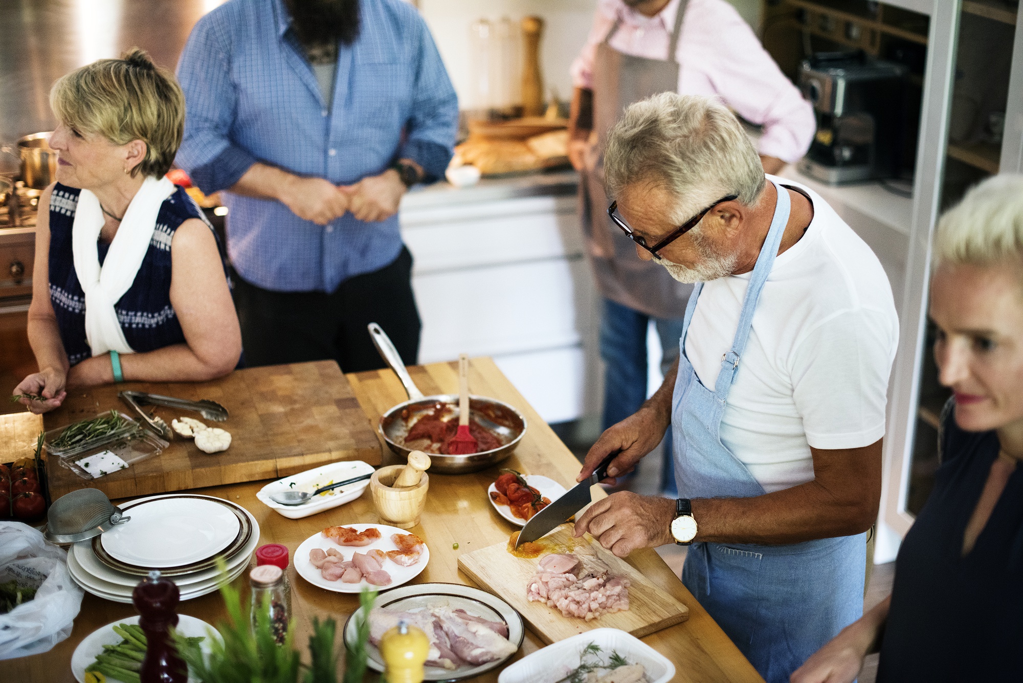 Group tasting and discussing plates